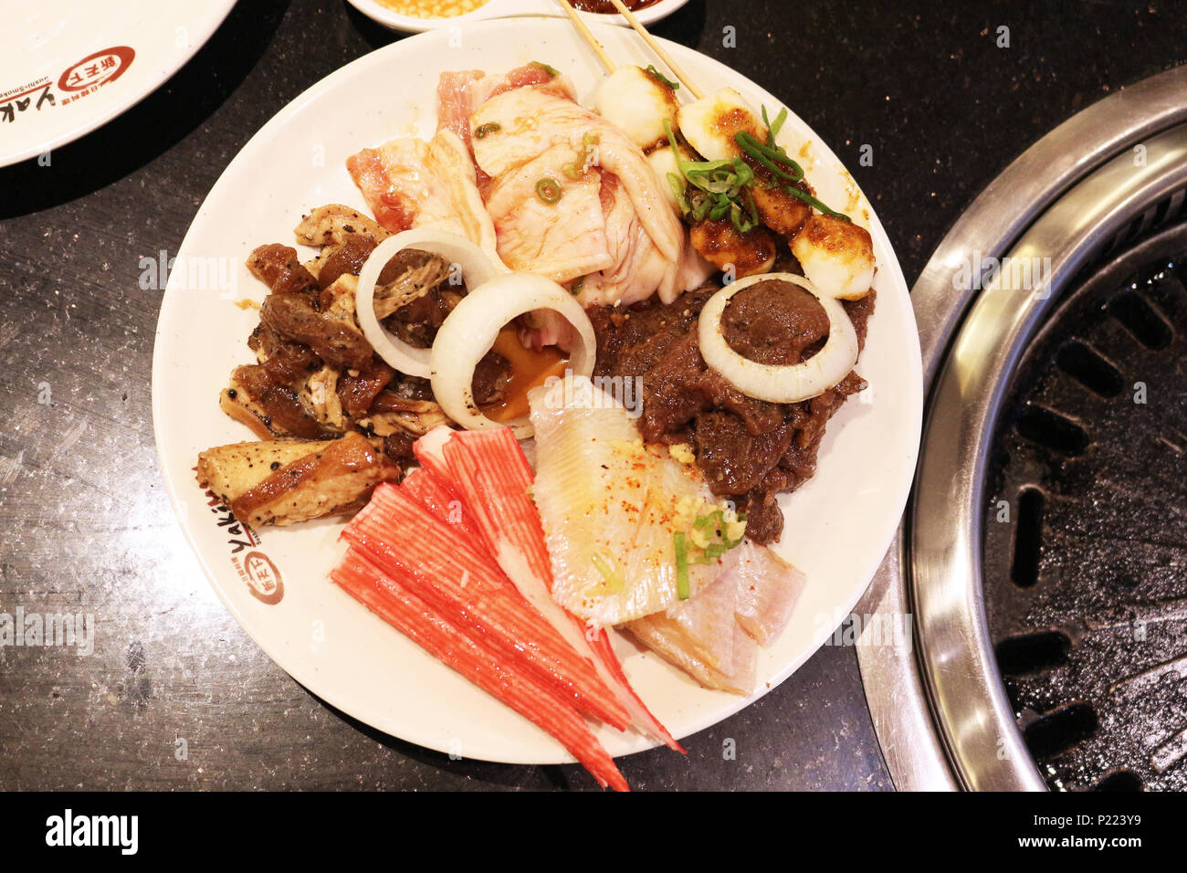 Grilling at Yakimix, Robinsons, Guerero St., Manila, Philippines Stock