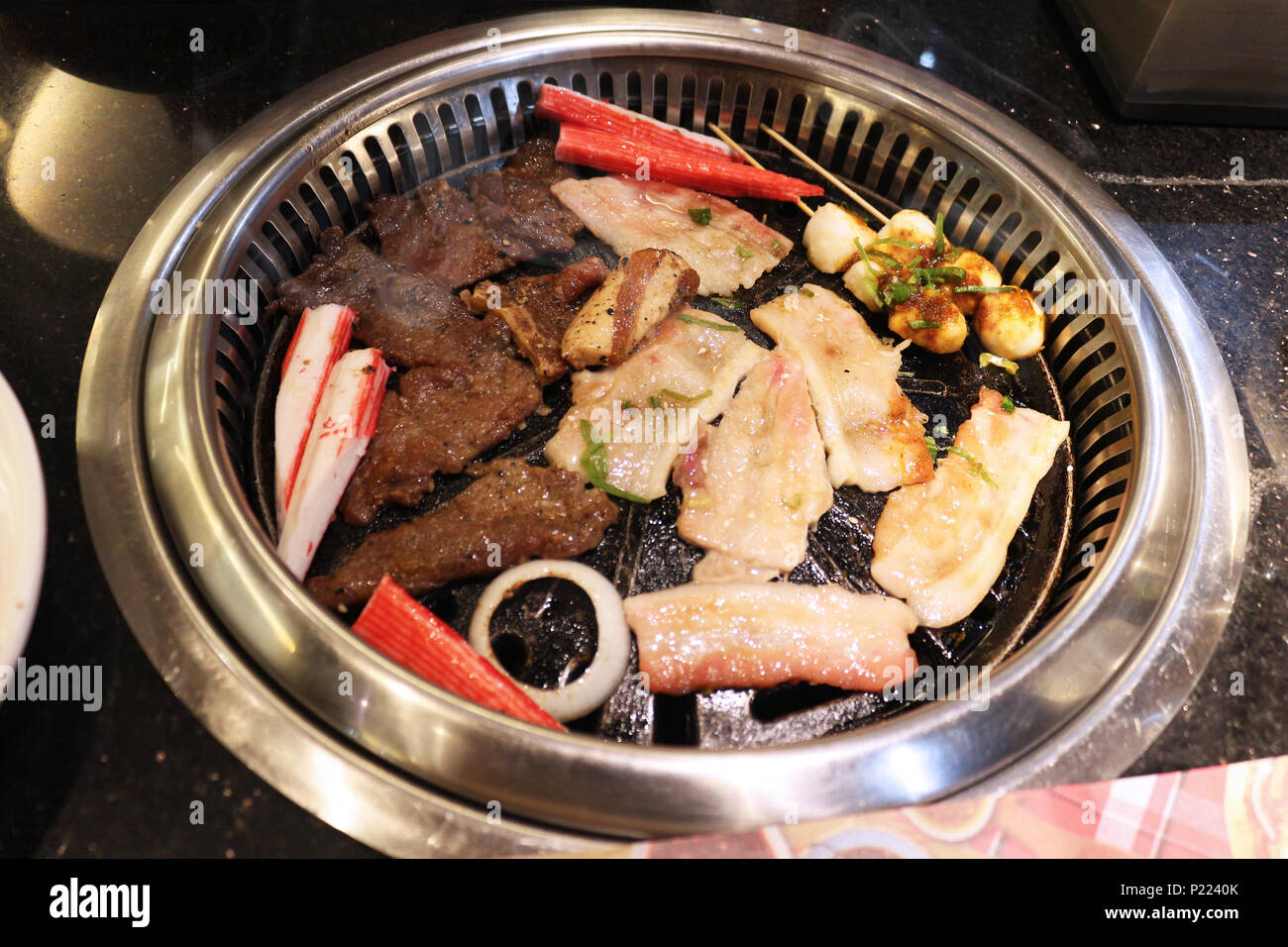 Grilling at Yakimix, Robinsons, Guerero St., Manila, Philippines Stock