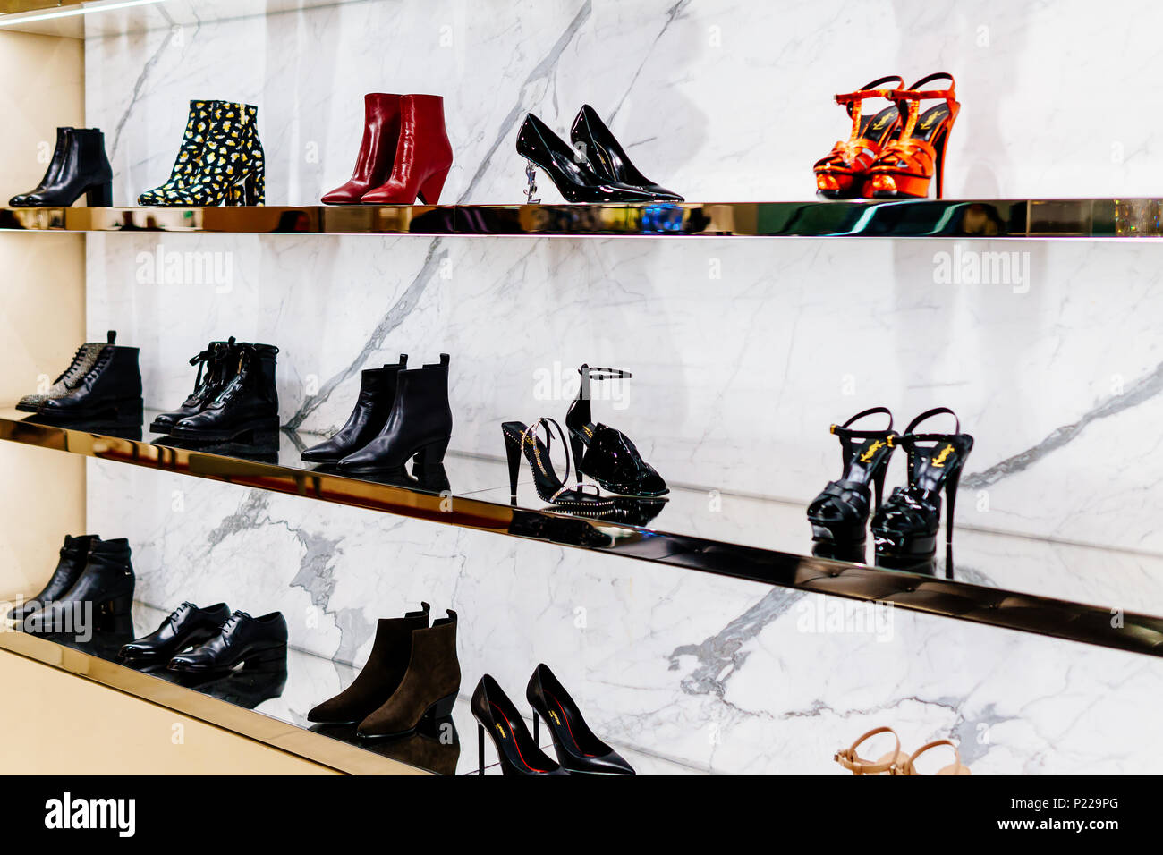 AMSTERDAM, NETHERLANDS - NOVEMBER 14, 2017: Wide Selection Of Women Shoes In Shopping Mall Store Inside Stock Photo