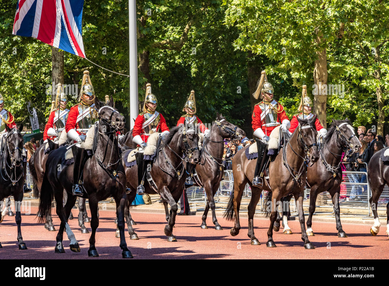 Soldiers of The Life Guards on horseback, making their way along The Mall at Trooping The Colour or Queen's Birthday Parade,London ,UK Stock Photo