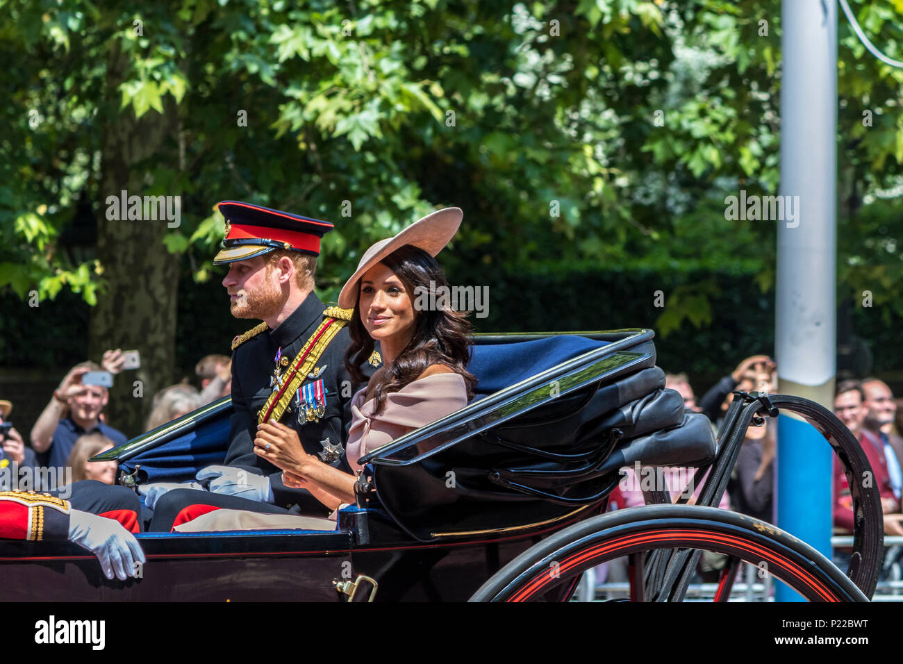 Prince Harry, The Duke of Sussex and Meghan Markle, The Duchess Of Sussex, ride together in a carriage at The Trooping Of The Colour  London,UK , 2018 Stock Photo
