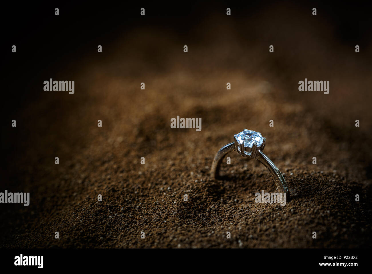 A precious lady's ring with a sparkling gemstone, copy space Stock Photo