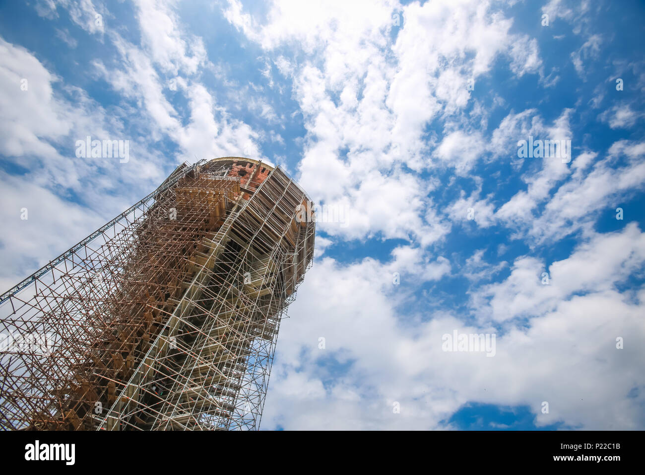 A low angle view of the Vukovar water tower under construction and intended to be a memorial place in Vukovar, Croatia. It is a symbol of the city suf Stock Photo