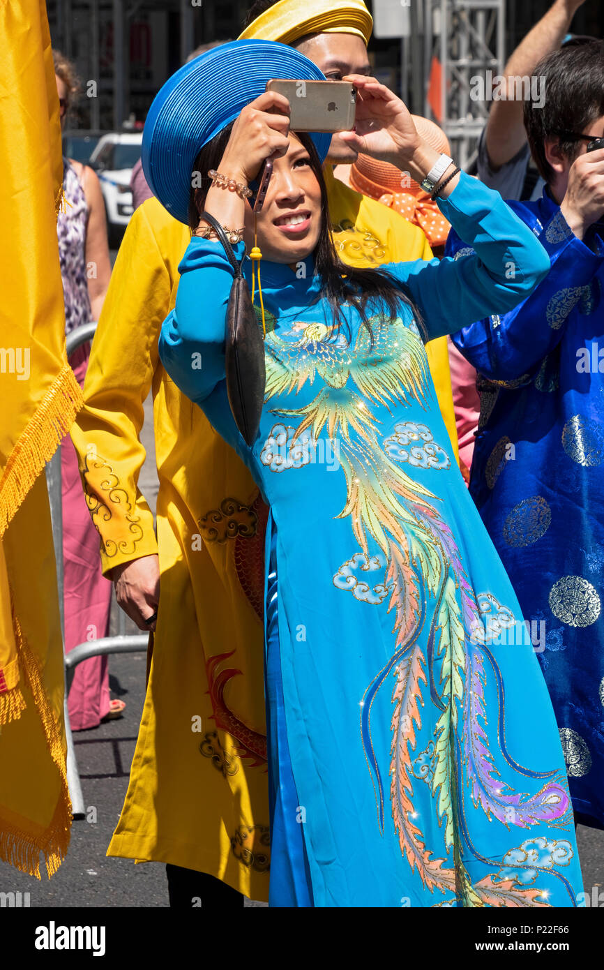 Posed portrait of a pretty Vietnamese American woman at the Vietnamese American Cultural Parade. Stock Photo