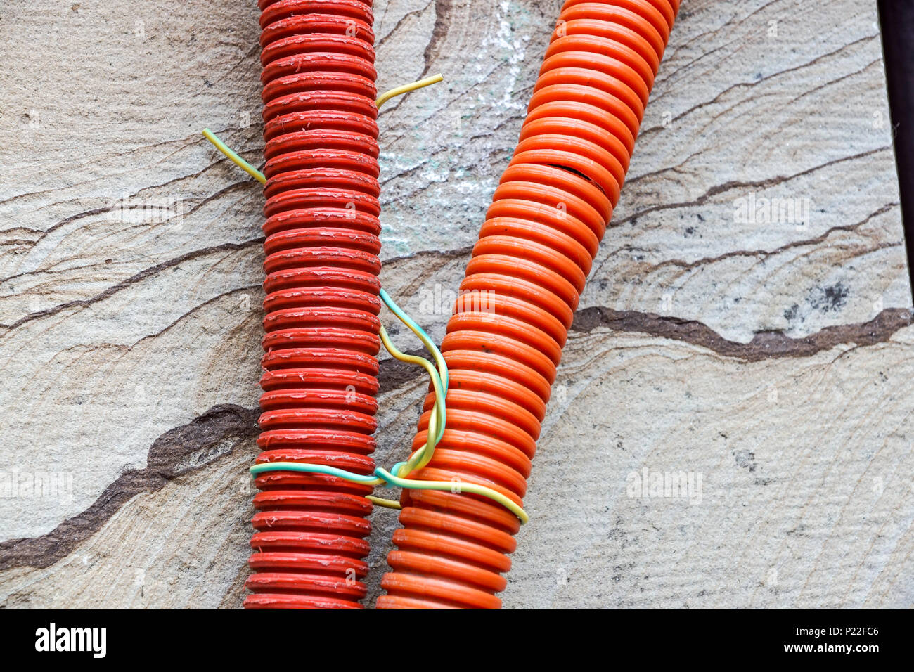 red plastic pipes for electric wires Stock Photo