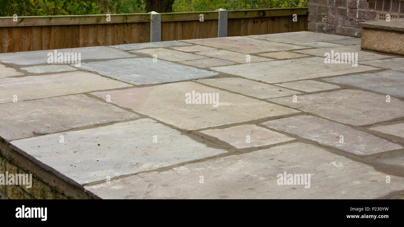 Newly laid patio made from indian slate. Stock Photo