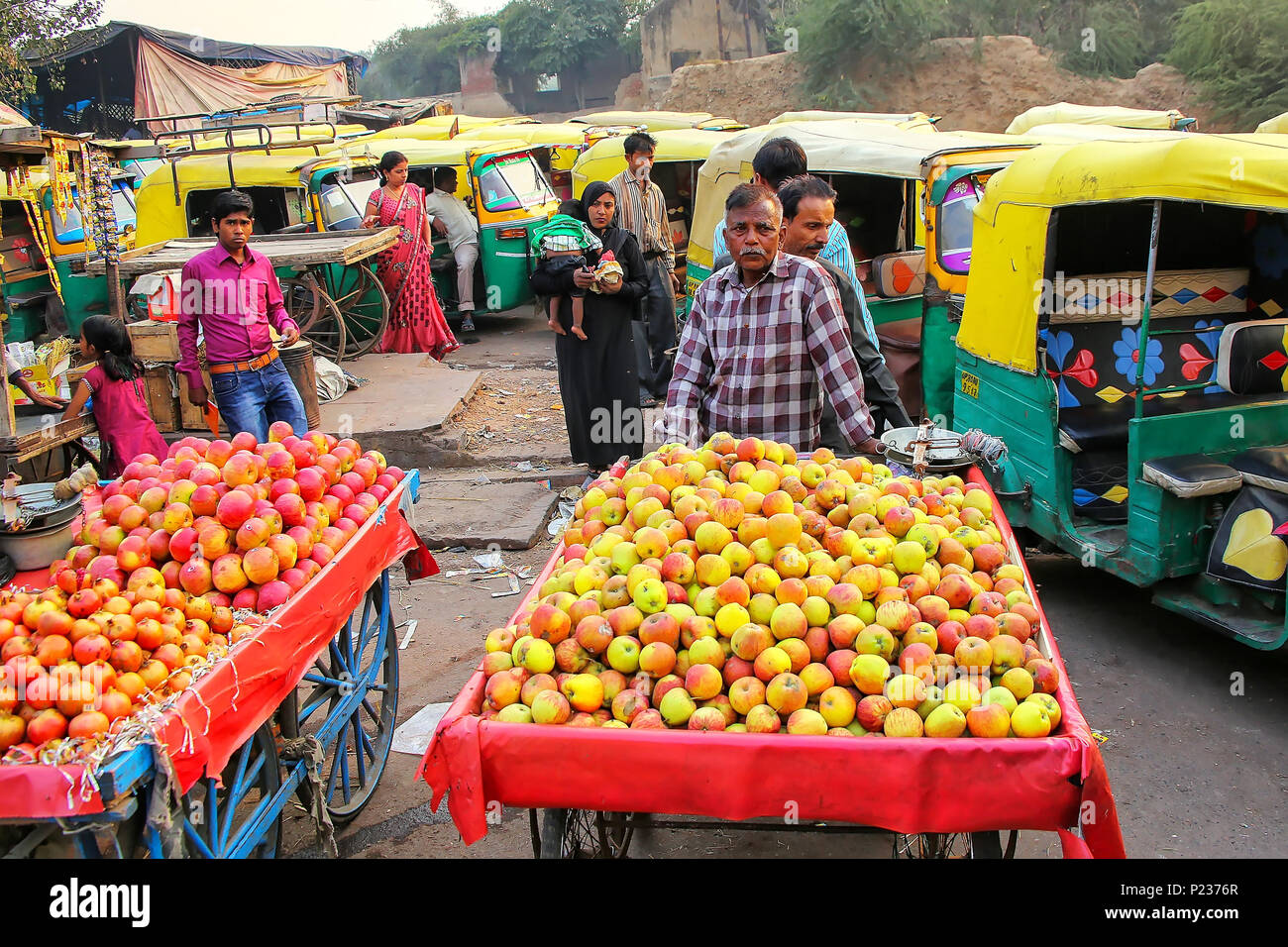 Man selling fruit rickshaw street hi-res stock photography and images -  Alamy