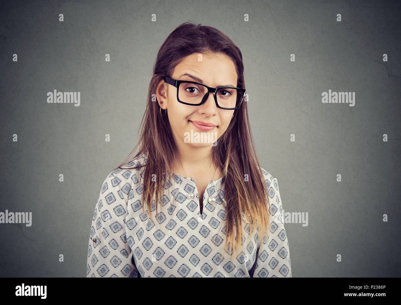 Woman with doubtful annoyed face expression Stock Photo