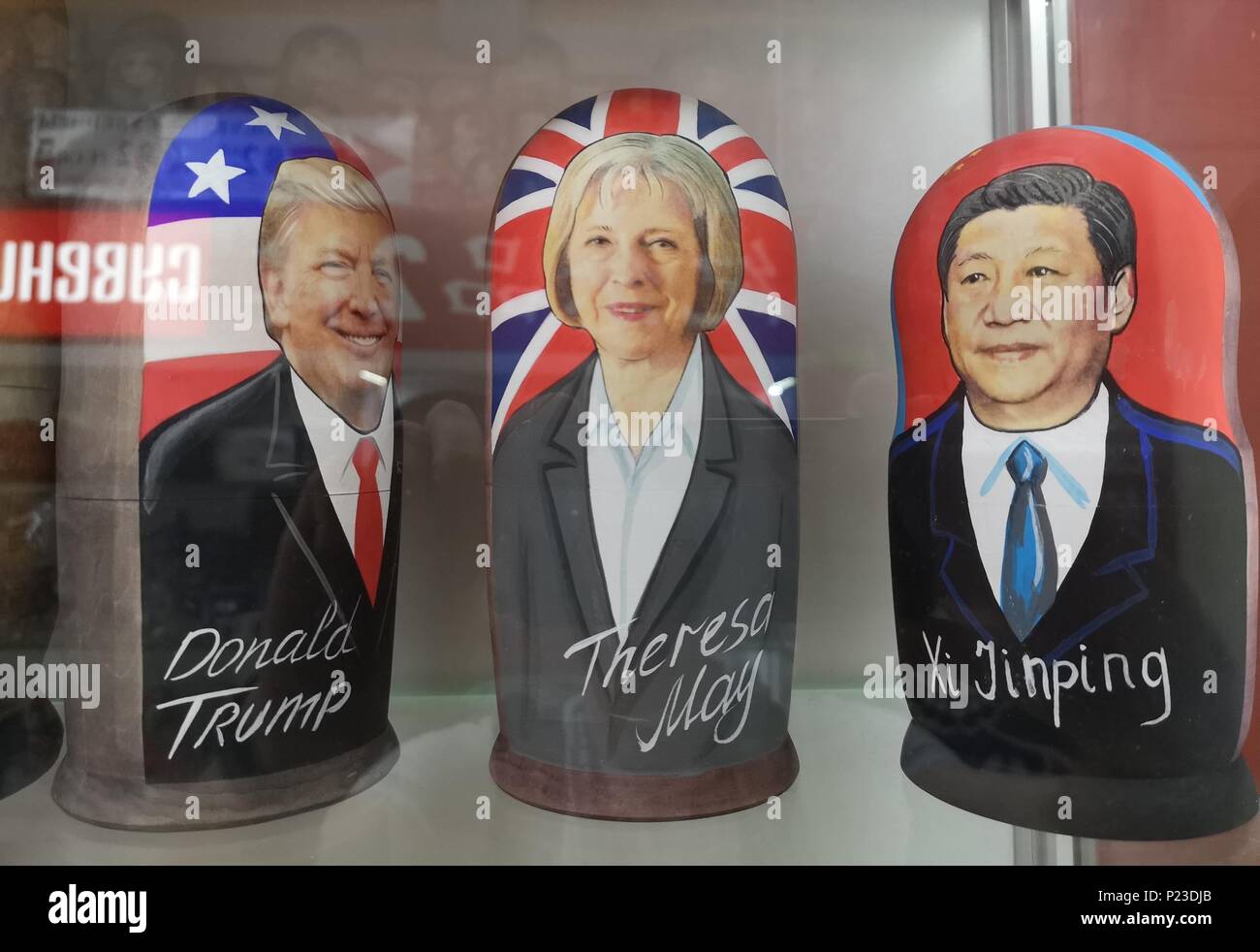 Russian dolls of political figure, US President Donald Trump, Prime Minister Theresa May and Chinese President Xi Jinping in a souvenir shop in the centre of Moscow which quoted a price of 7,000 Russian rubles (&Acirc;&pound;84) for the wooden likeness of the England captain Harry Kane as anticipation builds for the opening of the World Cup. Stock Photo