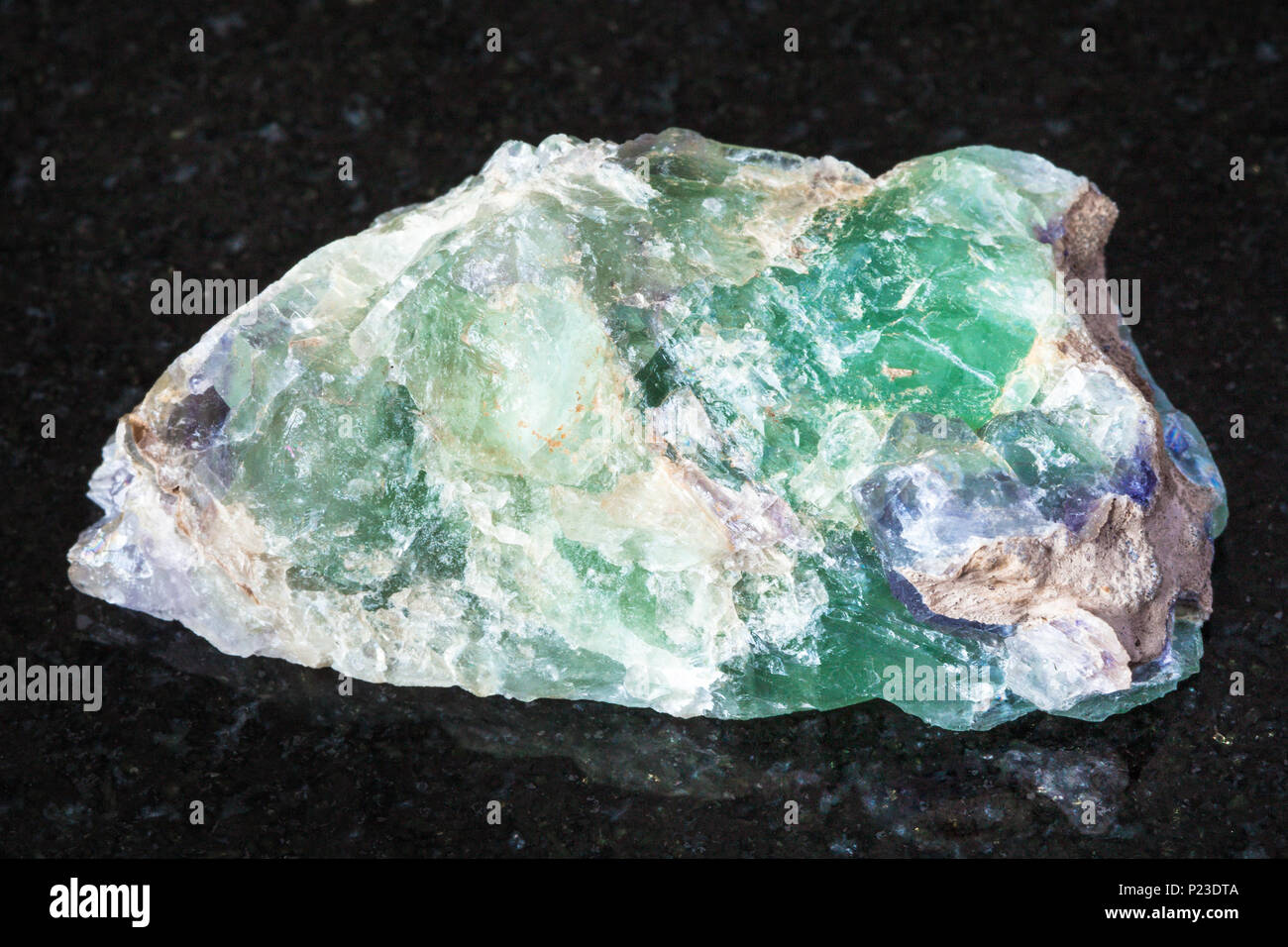macro shooting of natural mineral - raw green Beryl, Chrysoberyl