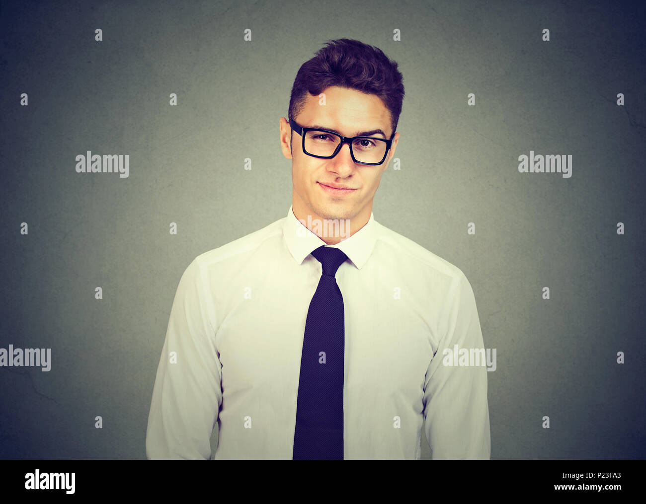 Frowning skeptic man thinking expressing doubts and concerns Stock Photo