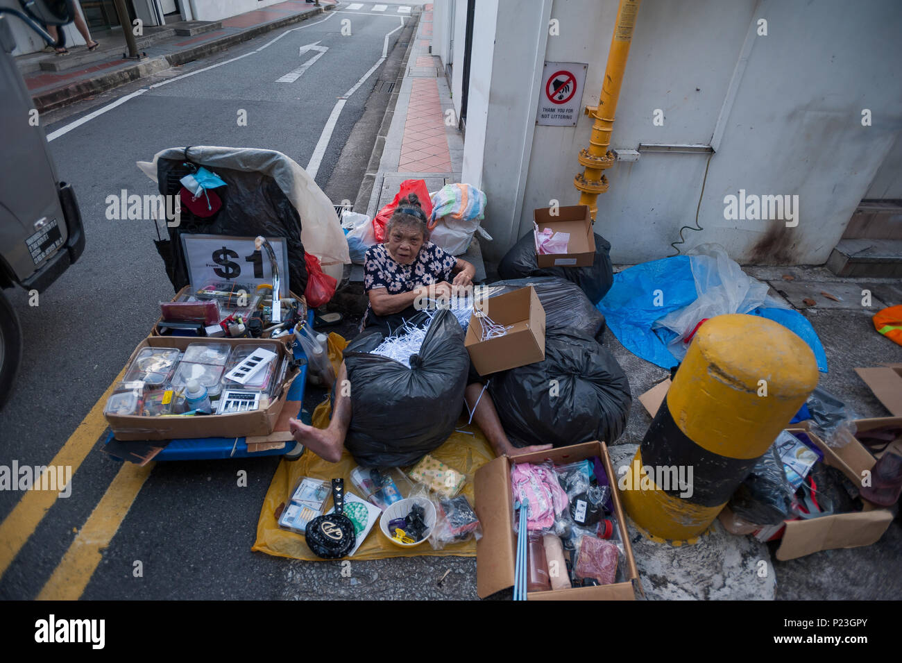 Singapore, Singapore, a woman selling trodel on the street Stock Photo