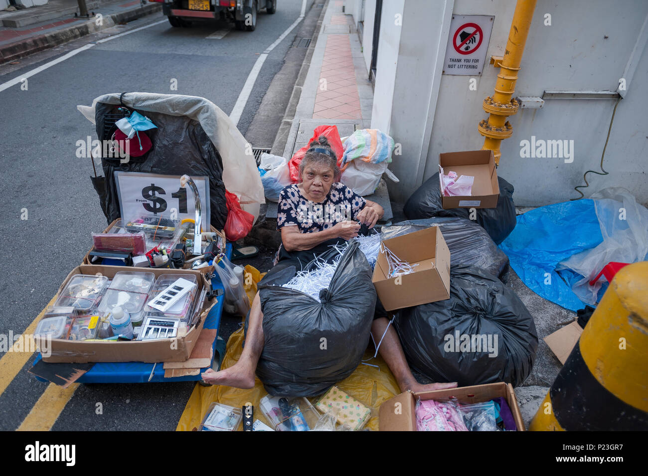 Singapore, Singapore, a woman selling trodel on the street Stock Photo