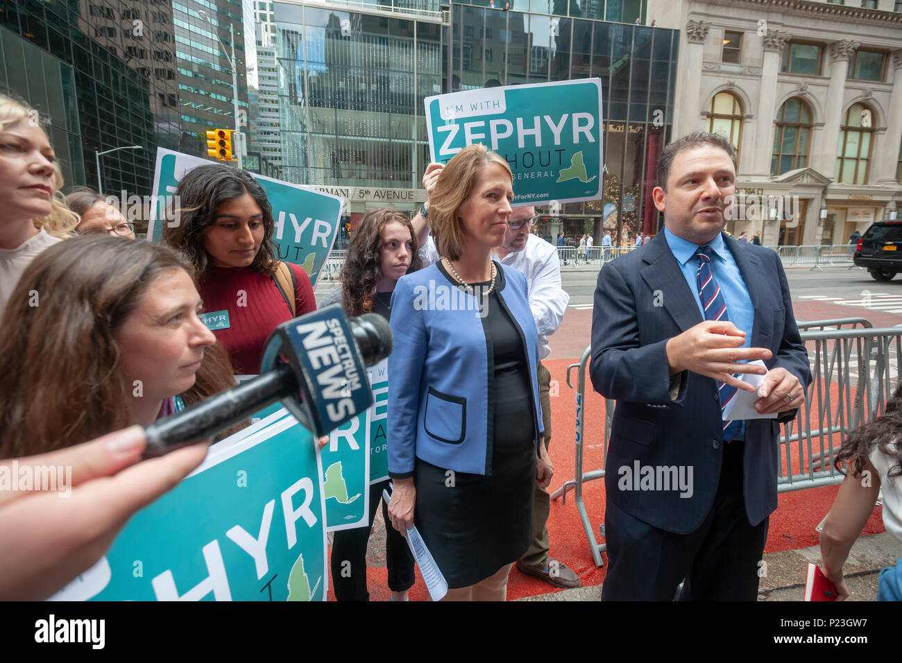 Standing on Fifth avenue by Trump Tower Democratic NYS Zephyr Teachout, left, with legal advisor Jed Shugerman joins supporters on Tuesday, June 5, 2018 as she announces that she is joining the field and running for New York State Attorney General, replacing disgraced Eric Schneiderman who resigned. Teachout made the announcement on the first day of petitioning, which she has to do to get on the ballot having not received 25% of the delegates' votes at the recent Democratic State Convention. (Â© Richard B. Levine) Stock Photo