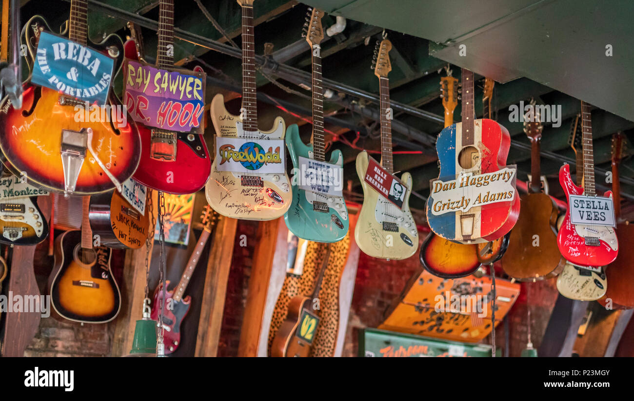 Memphis, Tennessee - Guitars hanging in the Rum Boogie Cafe on Beale Street, where restaurants and blues clubs lure tourists. Stock Photo