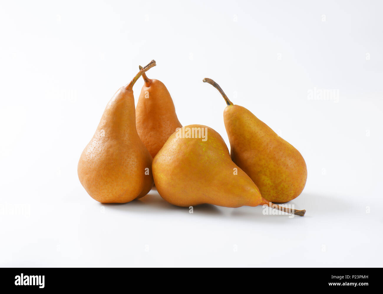ripe bosc pears on white background Stock Photo