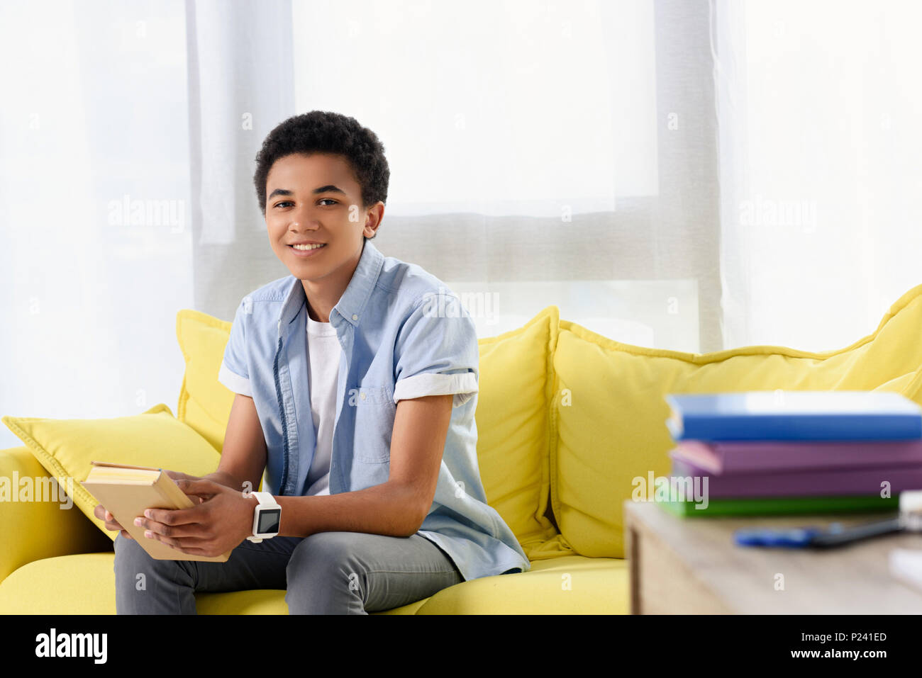 African american teen boy sitting hi-res stock photography and images ...