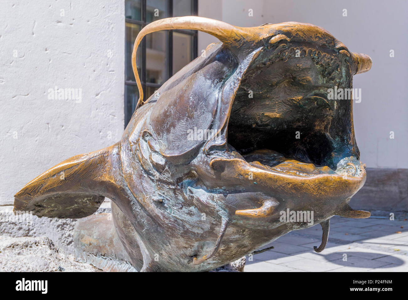 German Hunting and Fishing Museum in the former Augustinian Church, bronze sculpture of a fish, Munich, Bavaria, Germany, Europe Stock Photo