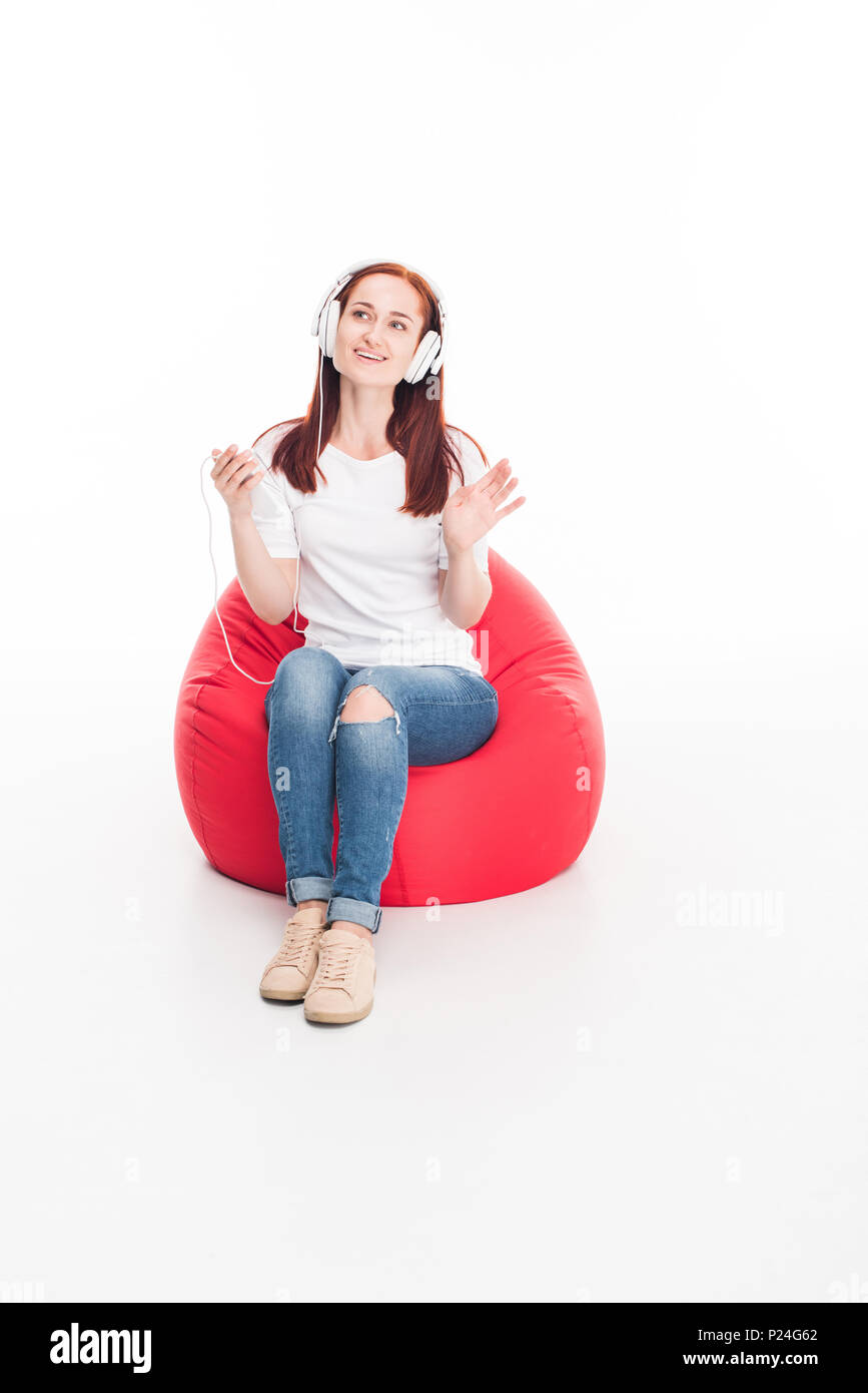 Girl sitting on bean bag hi-res stock photography and images - Alamy
