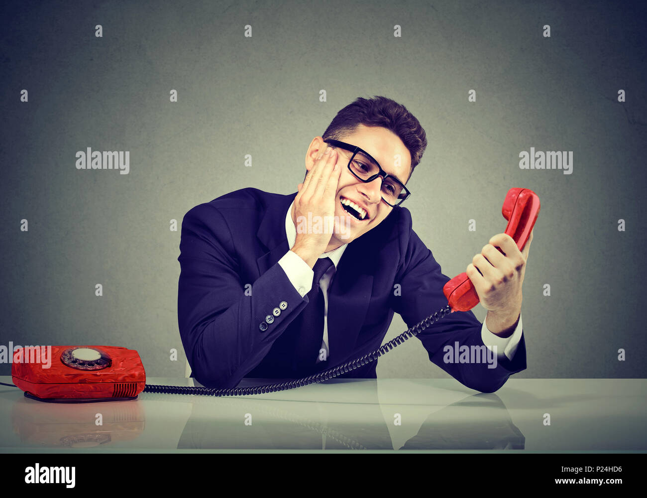 Young man in love talking on a phone Stock Photo