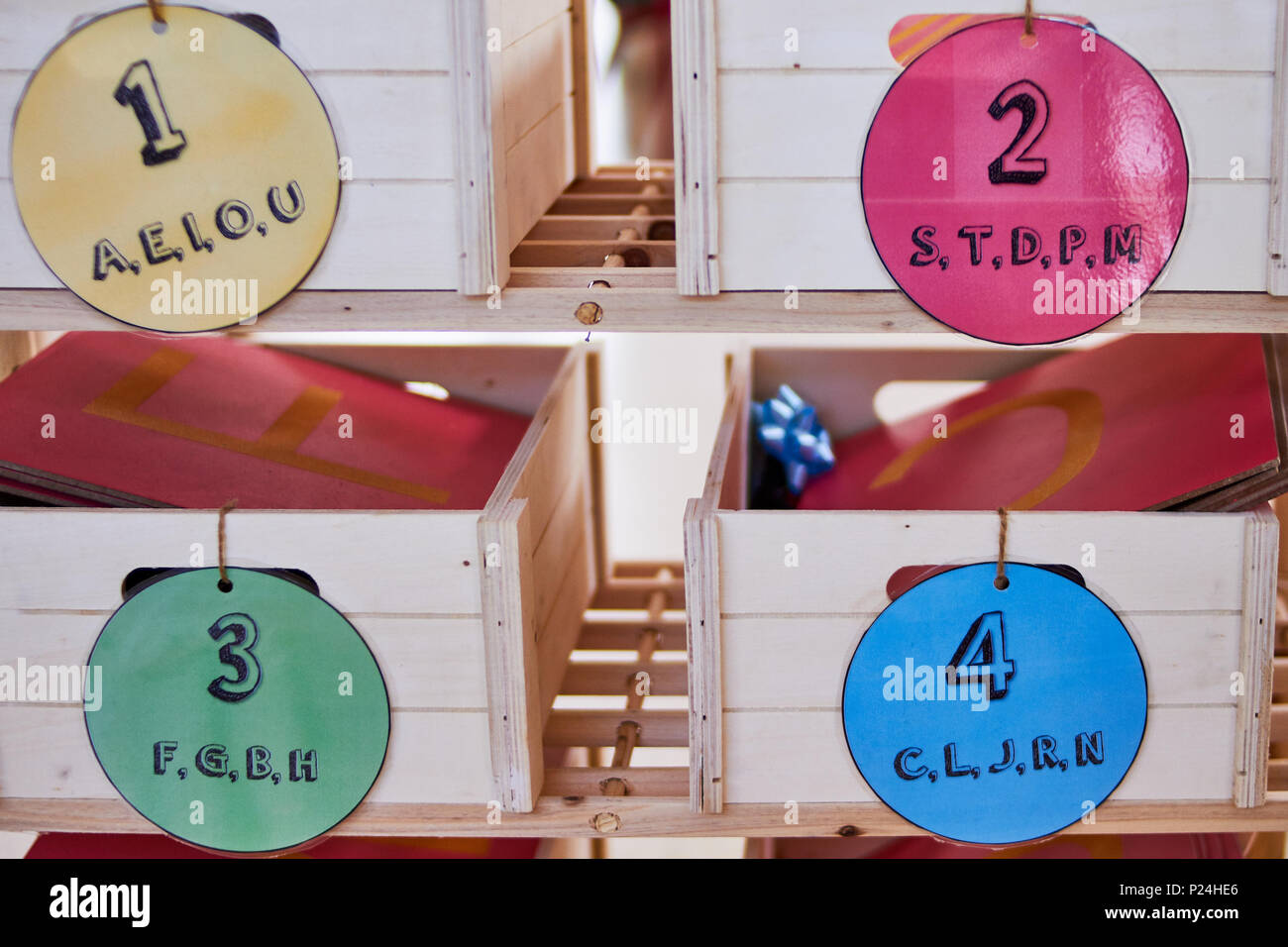 Wood Montessori pronunciation boxes Stock Photo - Alamy