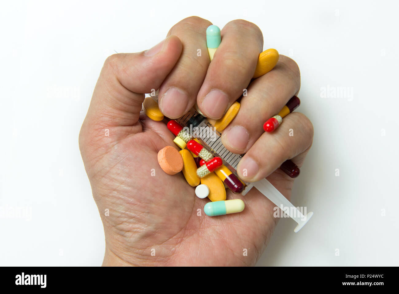 Hand full of pills Stock Photo Alamy