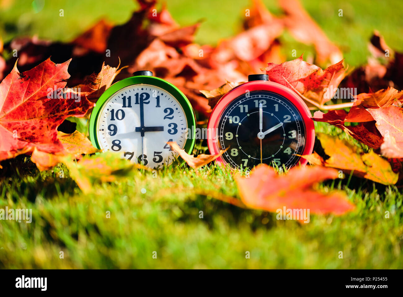 Fall time. Zeitumstellung. Two Alarm Clocks.