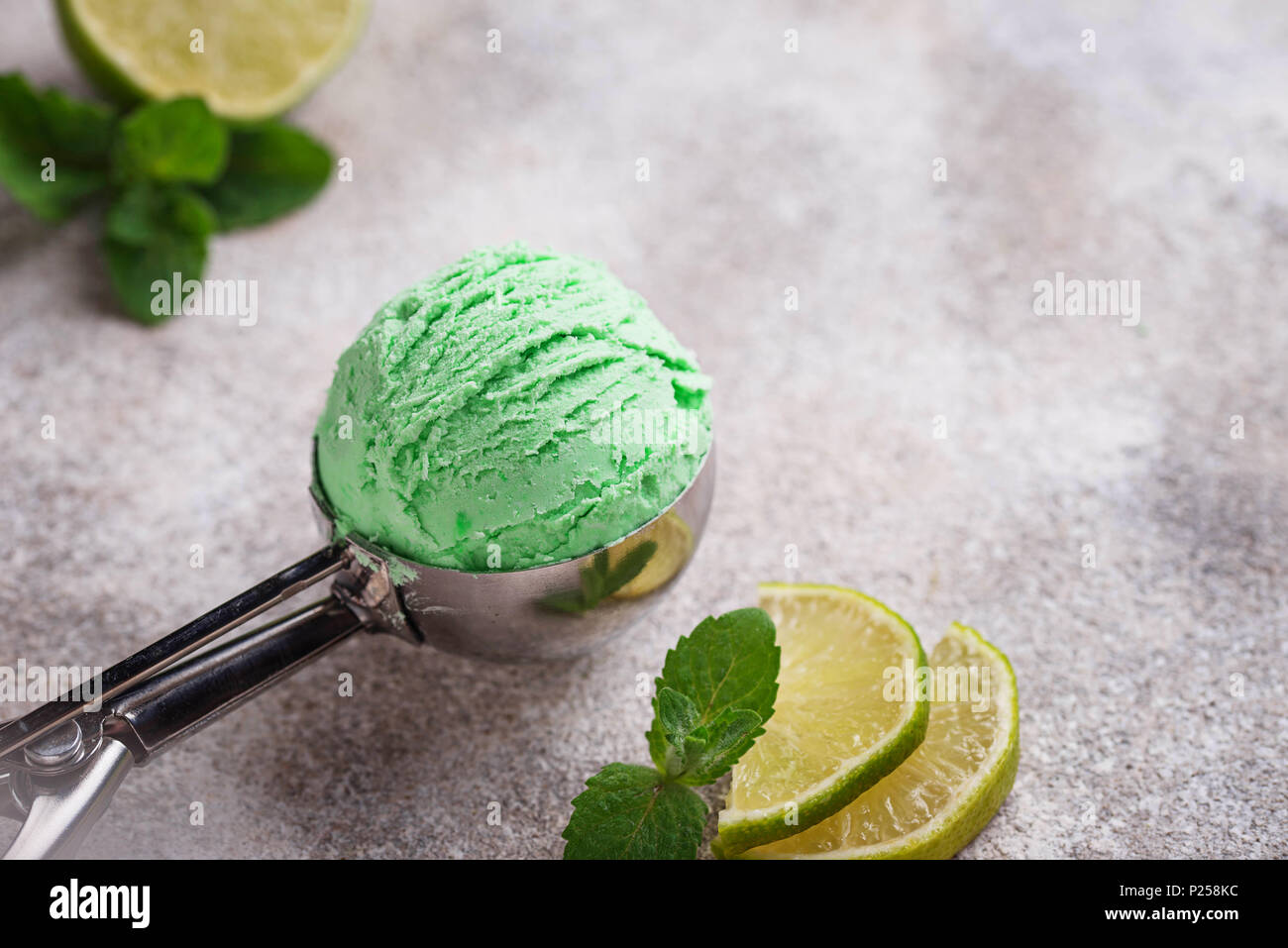 Ice cream ball with mint and lime Stock Photo Alamy
