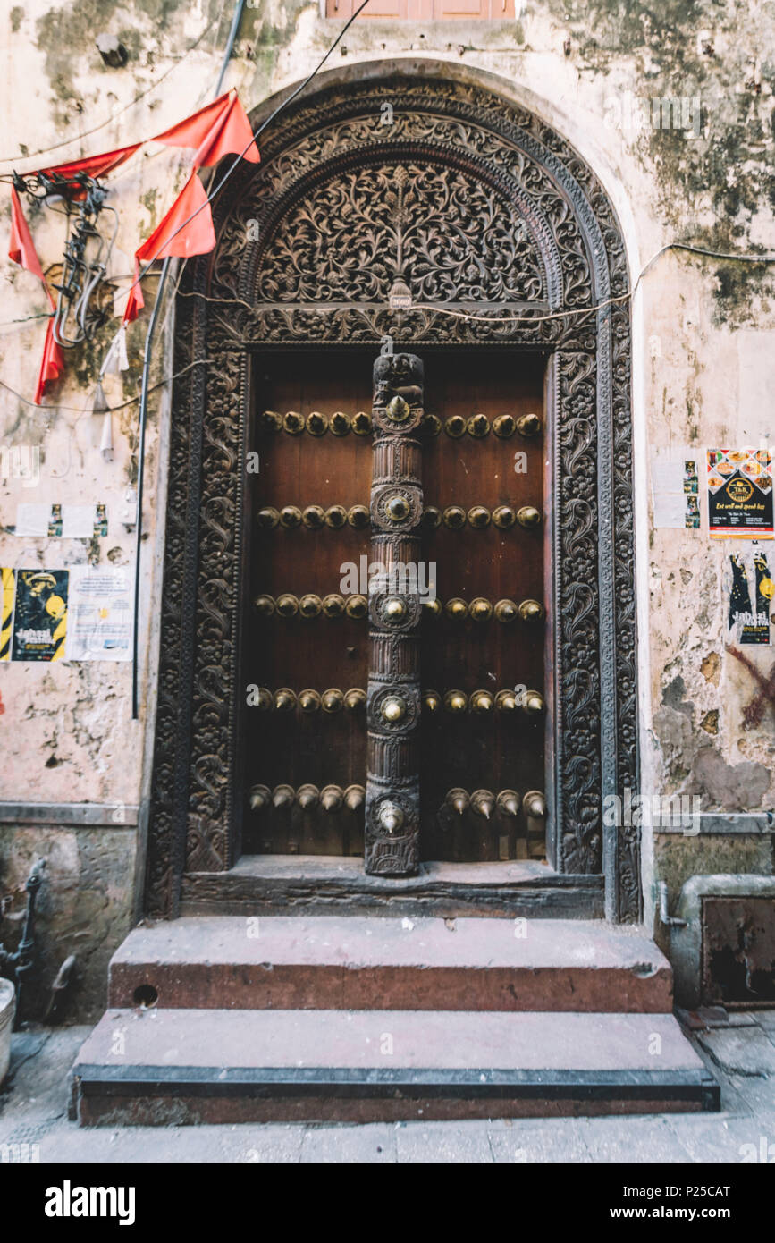 East Africa, Tanzania, Zanzibar, typical carved wooden door of Stone Town. Stock Photo