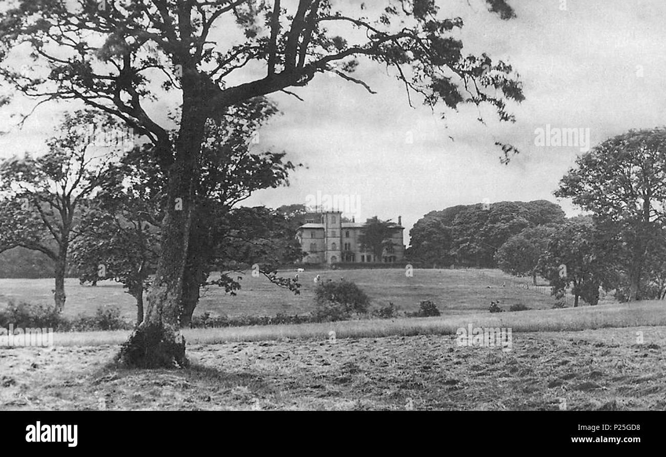 . English: Ireby Grange at High Ireby, 1 mile to the south from the village of Ireby, in the civil parish of Ireby and Uldale, in Cumbria, England. The mid-19th-century Ireby Grange was destroyed by fire in 1957. The house and estate was acquired in 1841 by Henry Granger, a London merchant, who in 1870 sold it to John Boustead. By 1906 it was transferred to James Gurney, and by the 1930s was largely unfurnished, and run-down when Hugh Walpole visited and decided to set the house as The Fortress, one of the four stories in his The Herries Chronicles novels. The glass plate photographer was Henr Stock Photo
