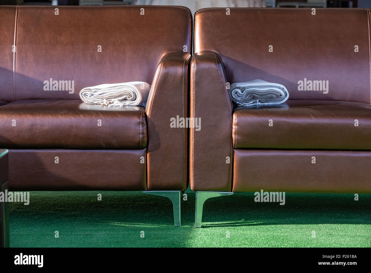 Close Up Modern Elegant Brown Leather Lounge Sofa With Woolen