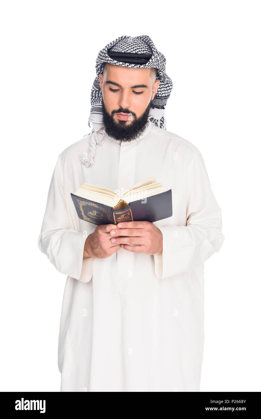 handsome muslim man reading quran isolated on white Stock Photo - Alamy