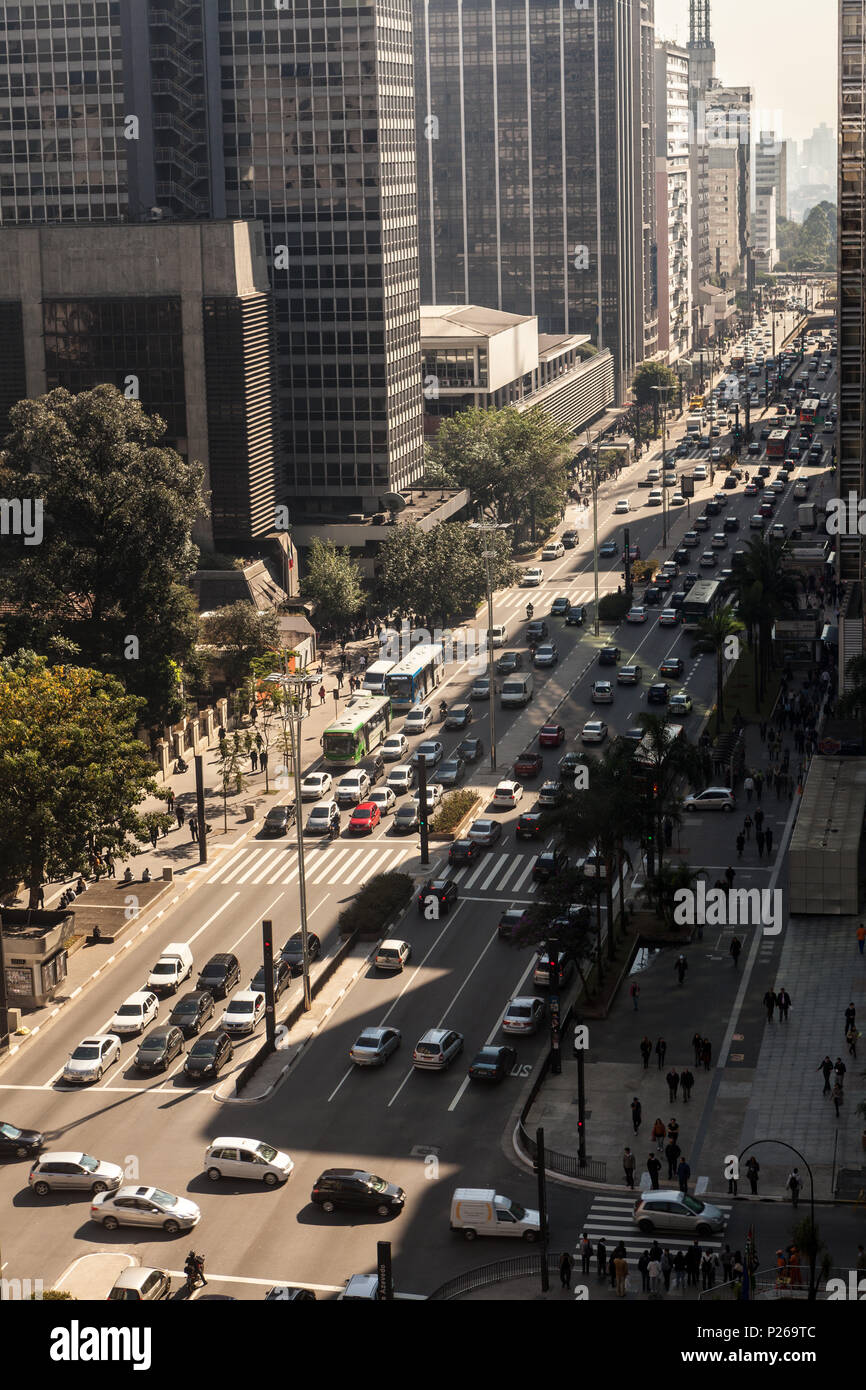 Car traffic on "Paulista" Avenue on a sunny day. Stock Photo