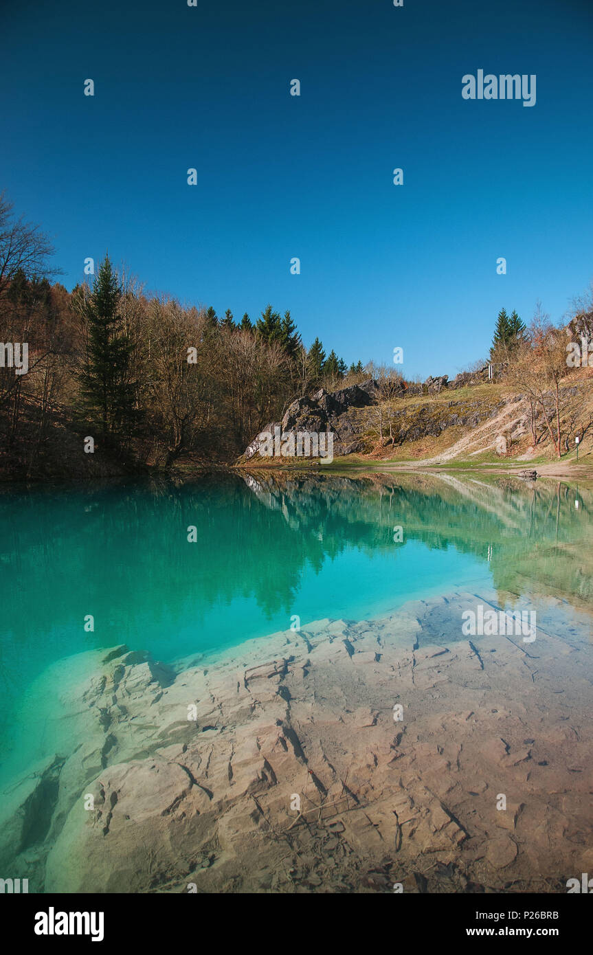 Beautiful blue mountain lake. The Blue Colour is caused by former limestone  mining. (Blauer See, Rübeland, Hüttenrode near Blankenburg, National Park  Harz in Germany Stock Photo - Alamy