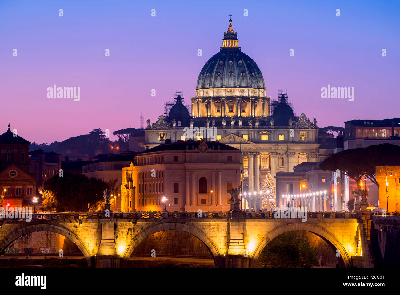 Rome, Lazio, Italy. Sunset on Tevere River, with Saint Peter Cathedral on the background. Stock Photo
