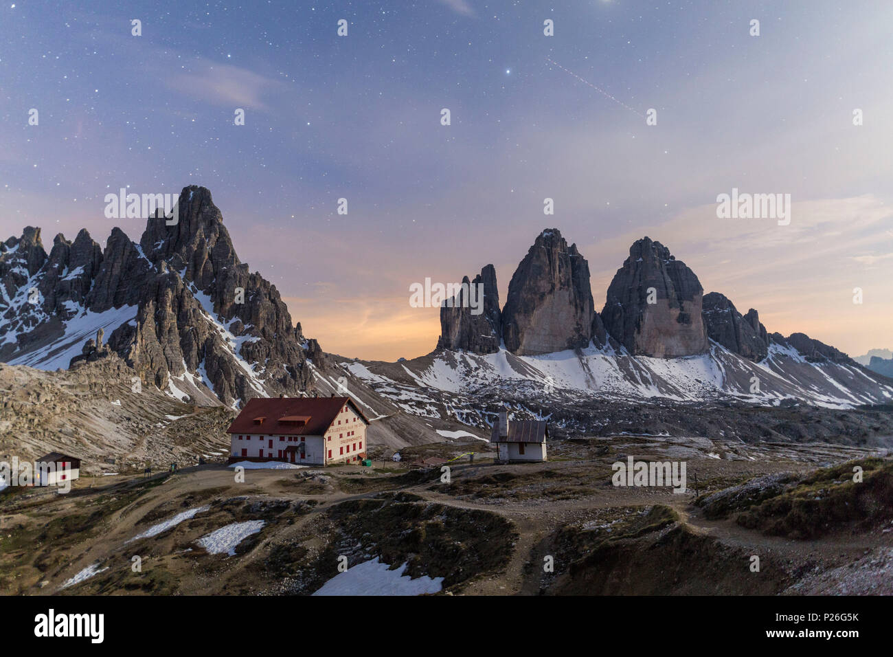 Starry sky on Locatelli Refuge and Tre Cime Di Lavaredo (Drei Zinnen), Sexten Dolomites, South Tyrol, Italy Stock Photo