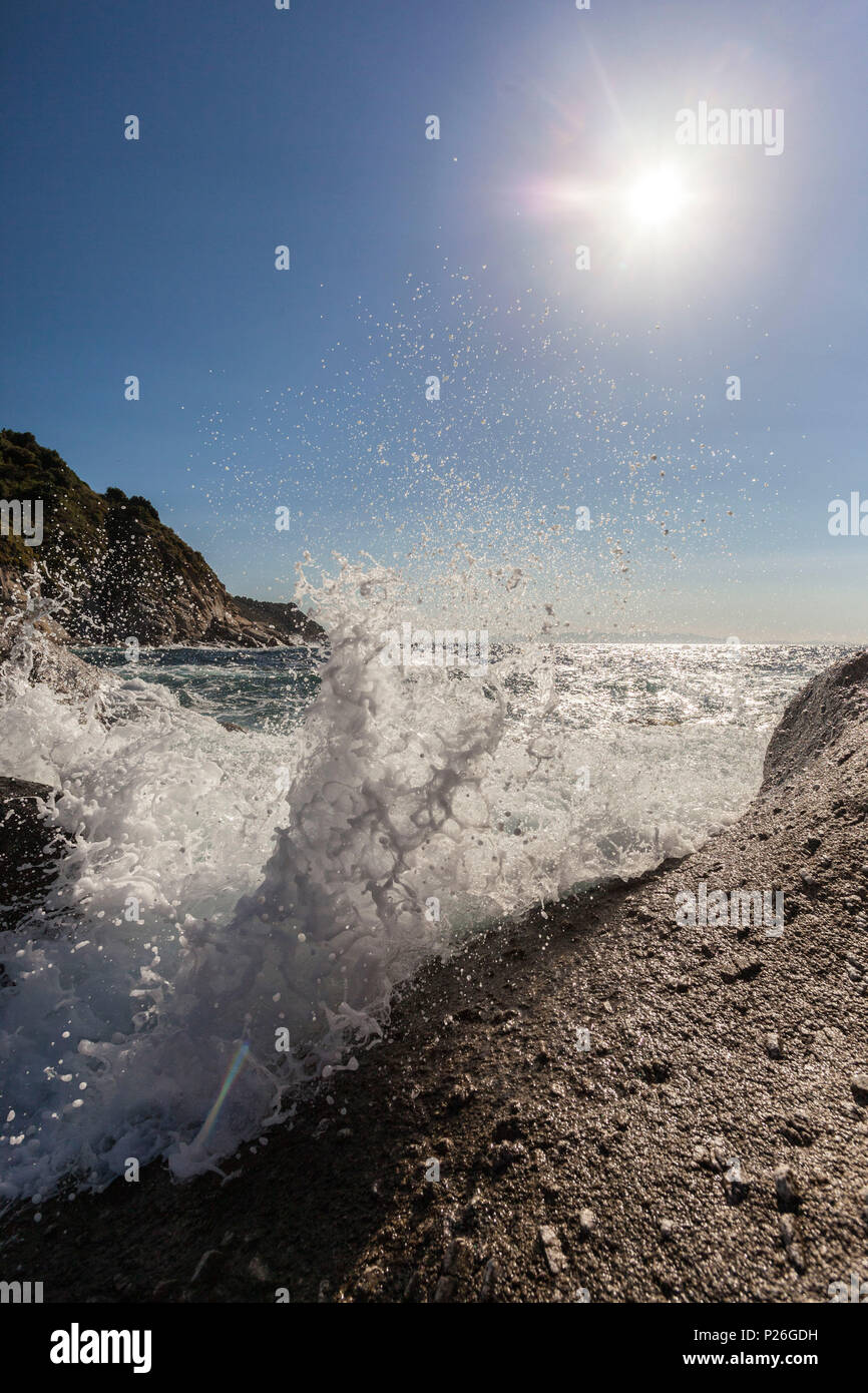 Waves crashing on rocks, Pomonte Beach, Marciana, Elba Island, Livorno Province, Tuscany, Italy Stock Photo