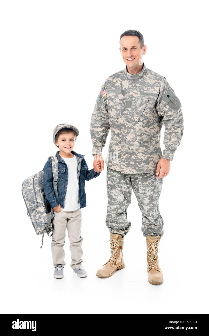 little boy and father in military uniform holding hands together isolated on white Stock Photo