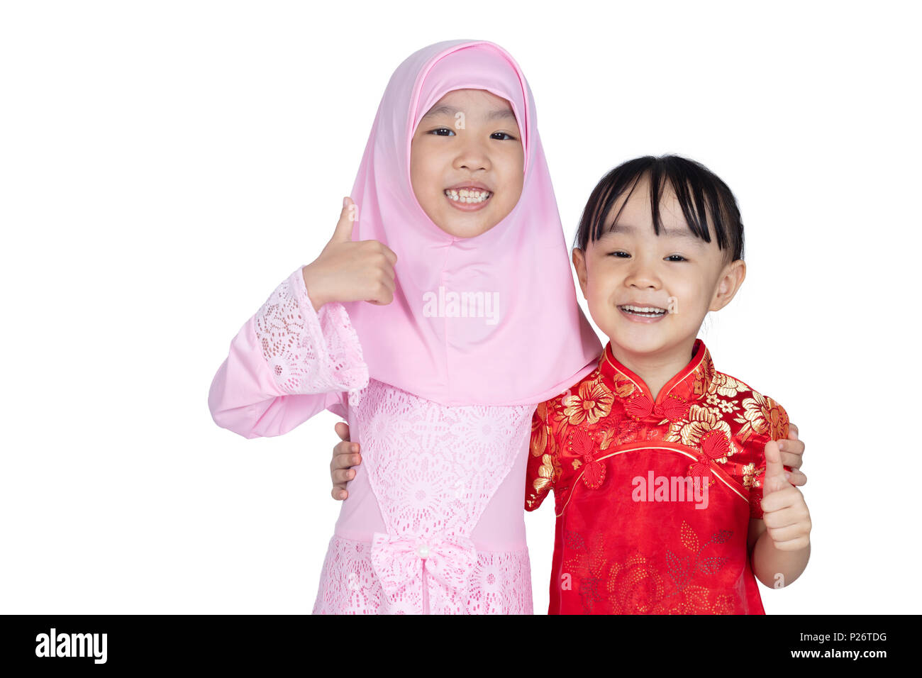 Asian Chinese little sisters wearing cheongsam and traditional