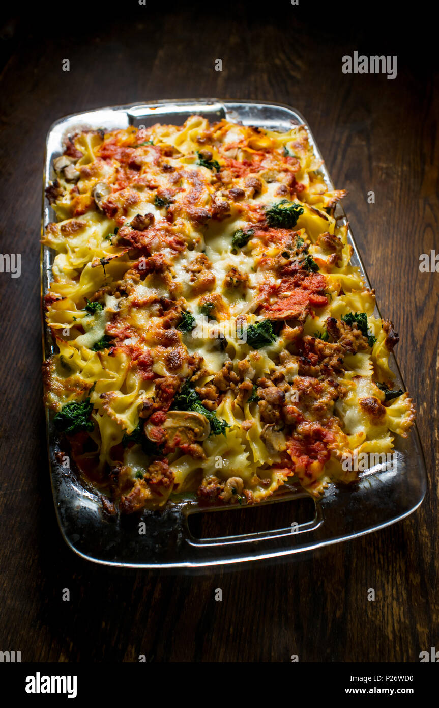 Bowtie pasta lasagna casserole with marinara sauce sausage mushrooms