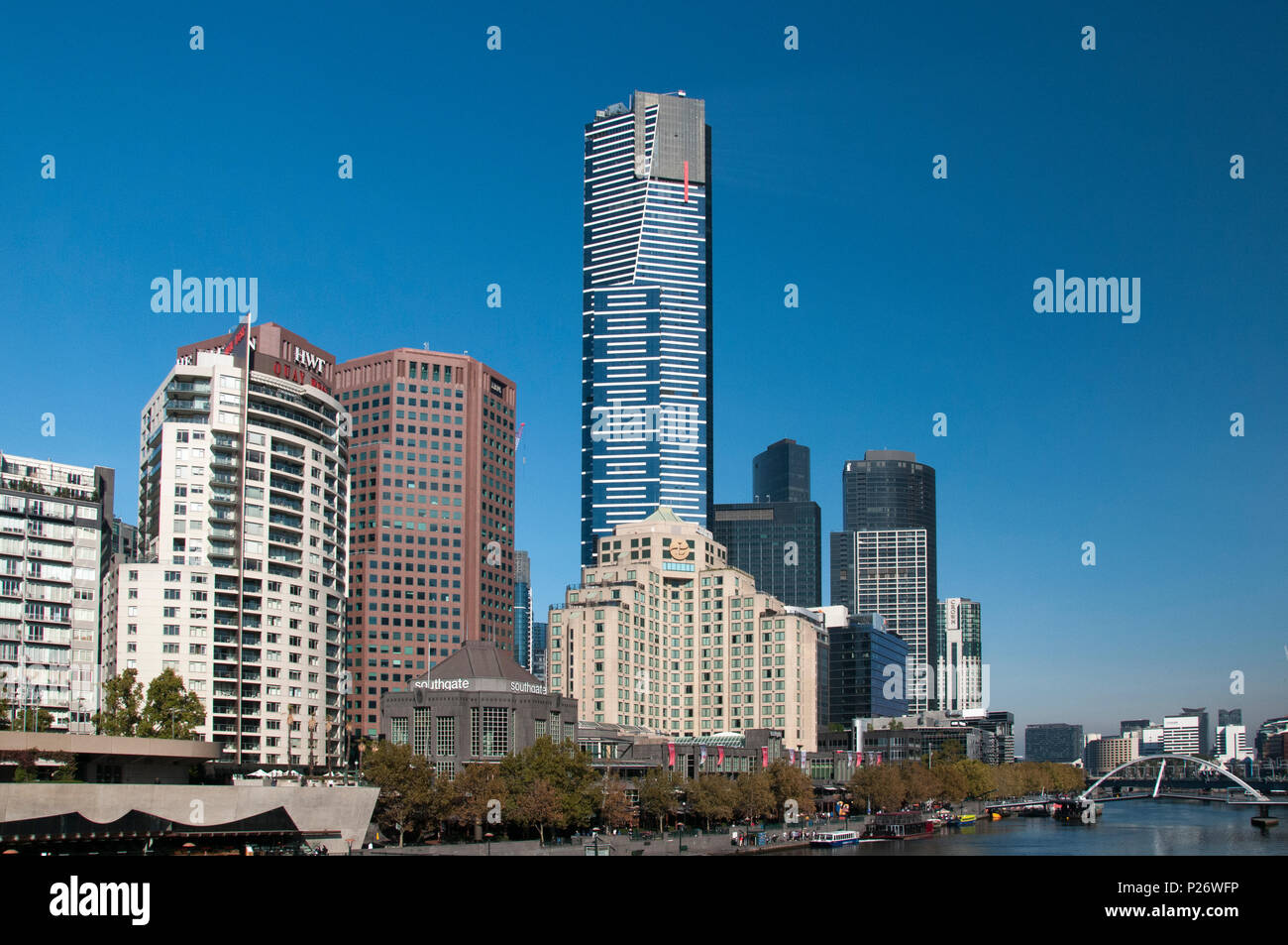 The 297-metre Eureka Tower skyscraper looms above the Southbank precinct along the Yarra River in Melbourne, Australia Stock Photo