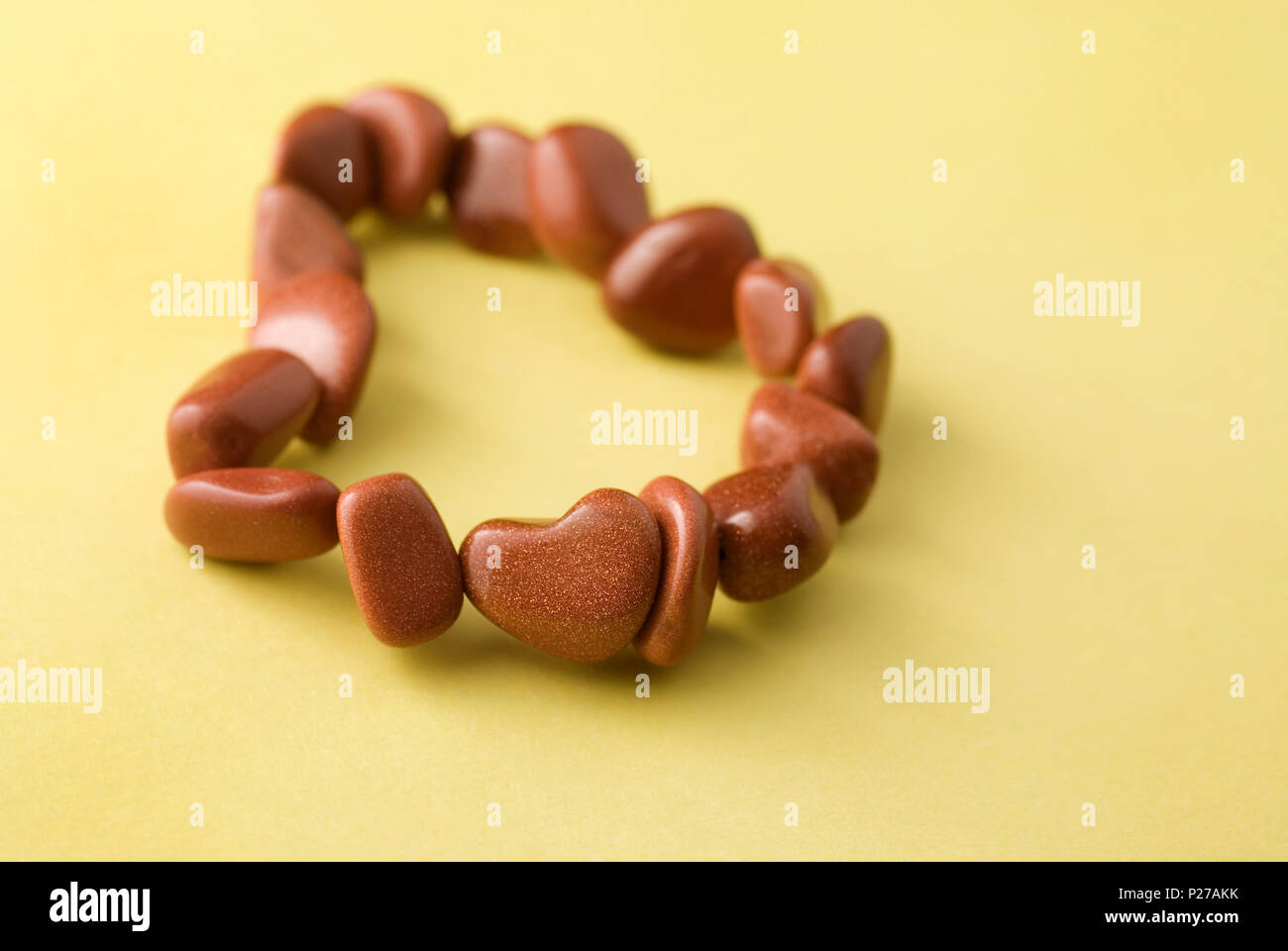 Goldstone Bracelet with Heart-Shaped  Bead Stock Photo