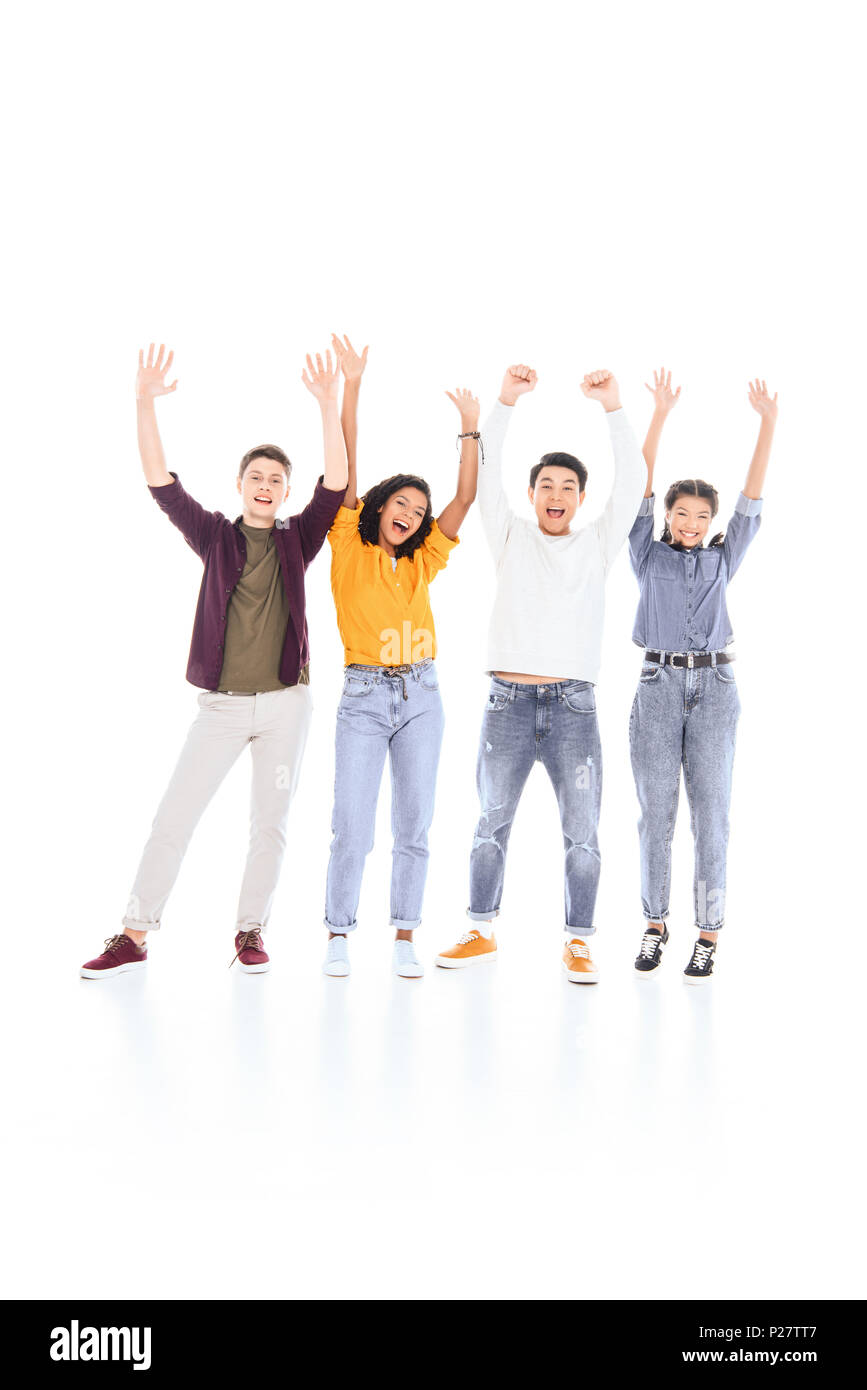 cheerful multicultural teenagers with outstretched arms isolated on white Stock Photo