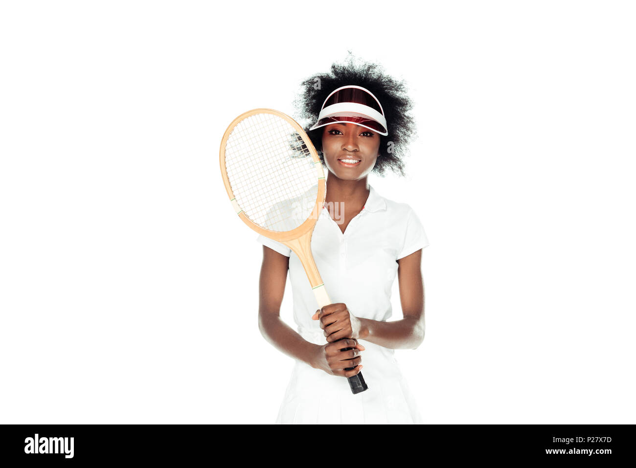 beautiful female tennis player in cap with racket isolated on white Stock Photo