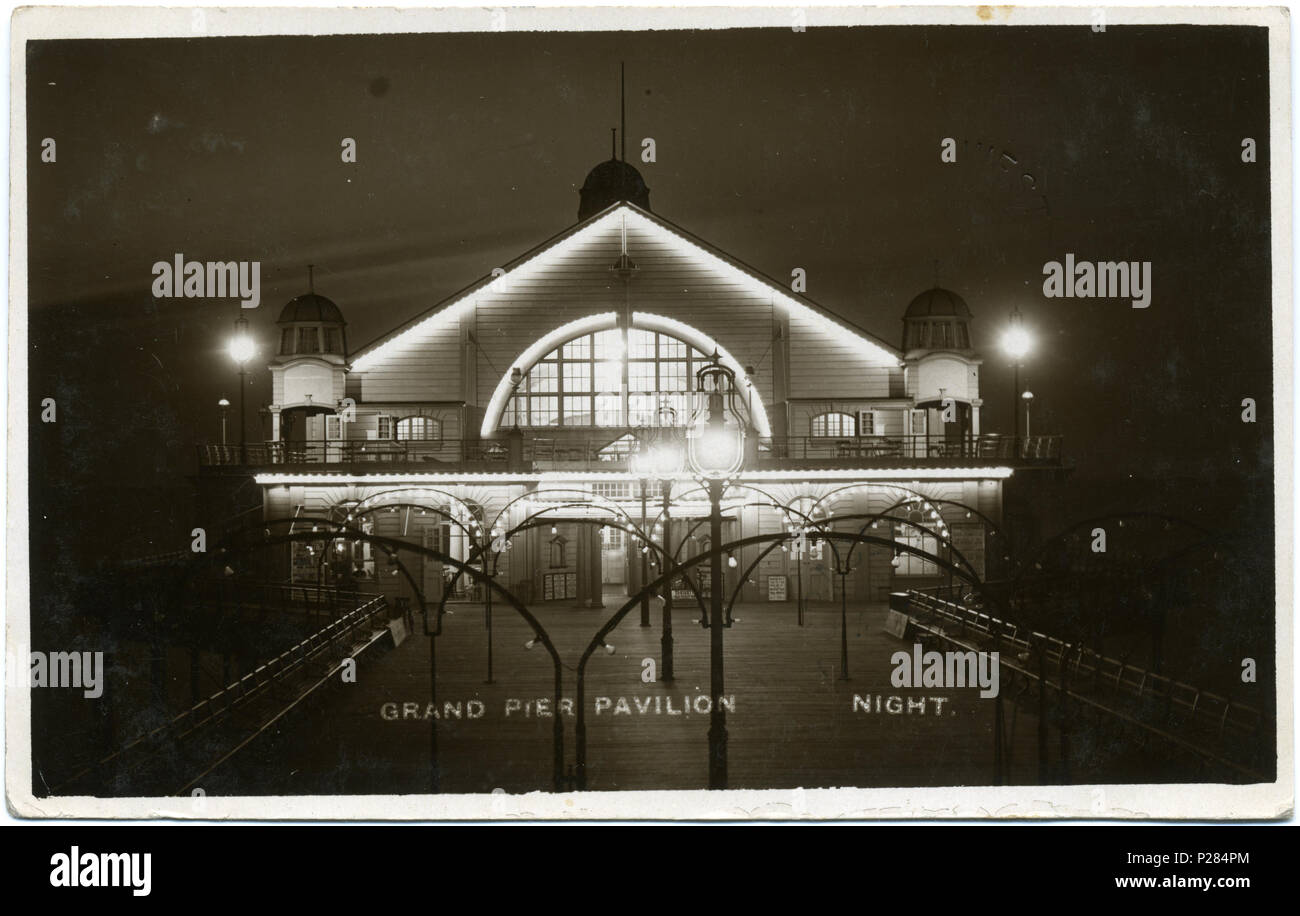 . Postcard of the Grand Pier Pavilion, Herne Bay, Kent illuminated on the night of its grand opening by the Lord Mayor of London on 3 August 1910. Original photograph by Fred C. Palmer also appeared in the defunct newspaper Herne Bay Press, August 1910. The Grand Pier Pavilion burned down in 1970. The photographer was Fred C. Palmer of Tower Studio, Herne Bay, Kent, who is believed to have died 1936-1939. Points of interest  A copy of this photograph was used by Paul Matisse in an artwork, having obtained the photograph from his stepfather Marcel Duchamp who visited Herne Bay in 1913. The came Stock Photo