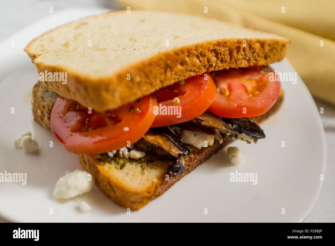 Portobello mushroom sandwich with goat cheese and pesto Stock Photo Alamy
