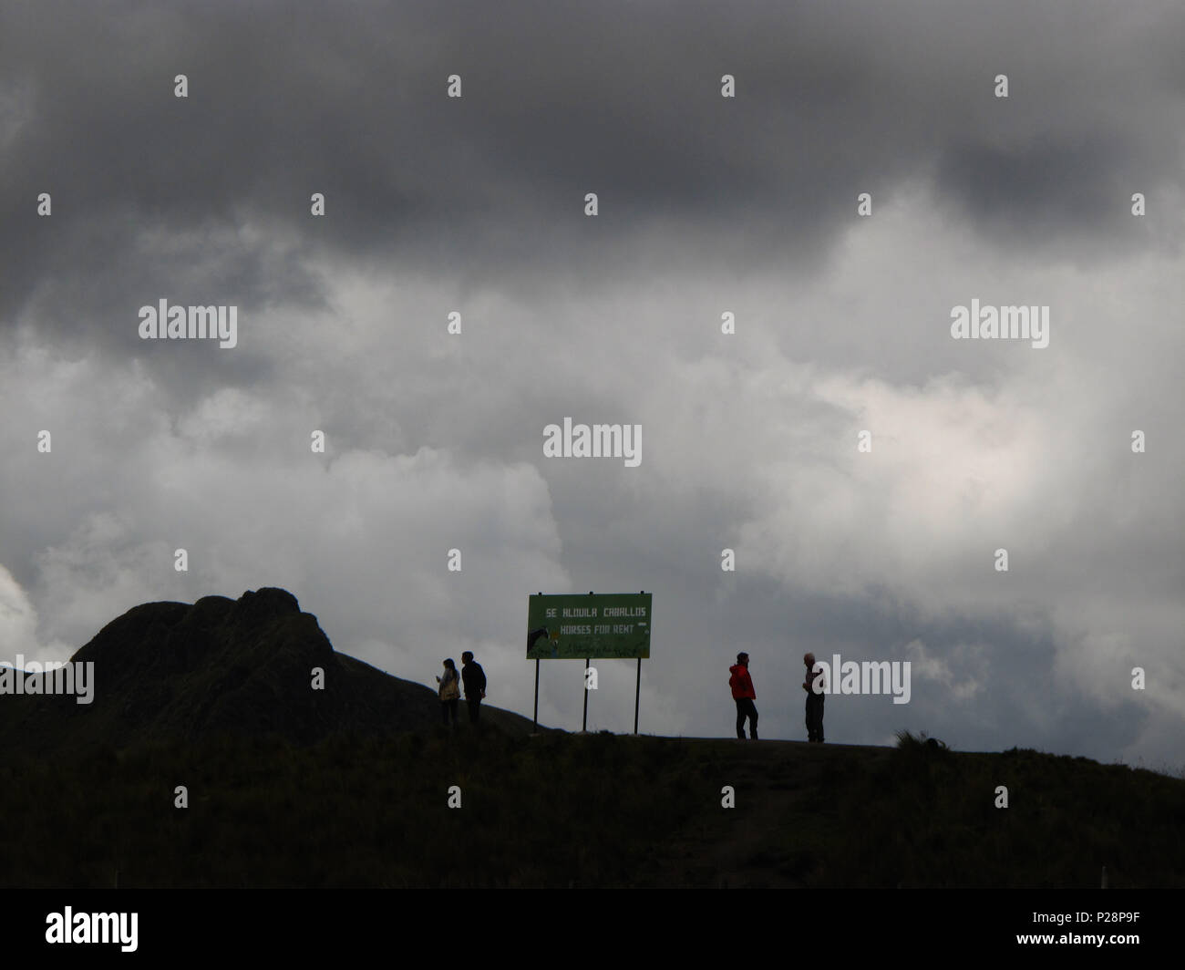 Cloud weather appears on top of a mountain in Quito, Ecuador with