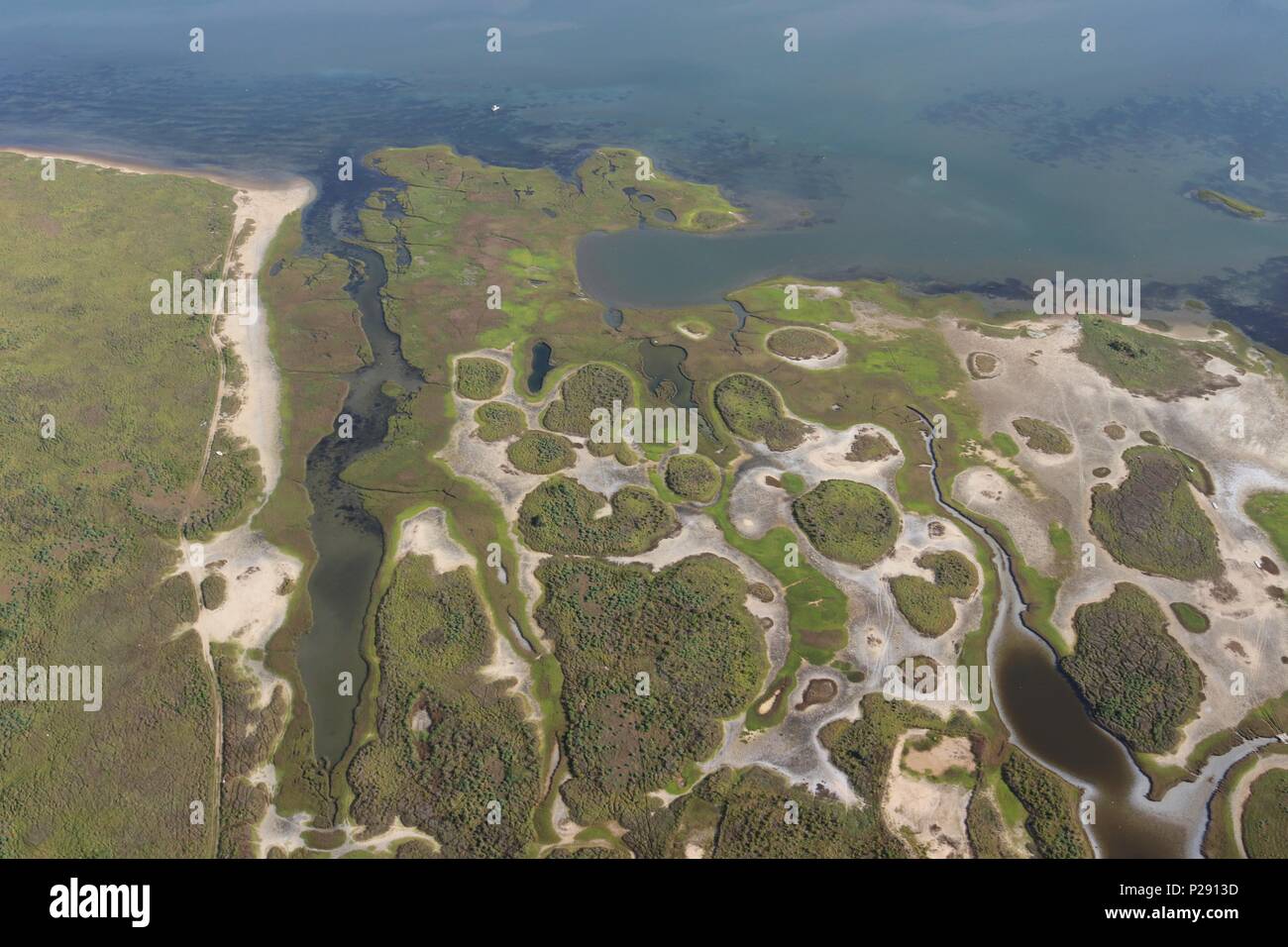 Aerial view of  the Texas Gulf Coast, Galveston Island, USA. Travel landscape panorama of West Galveston Bay, a large nature preserve area. Stock Photo