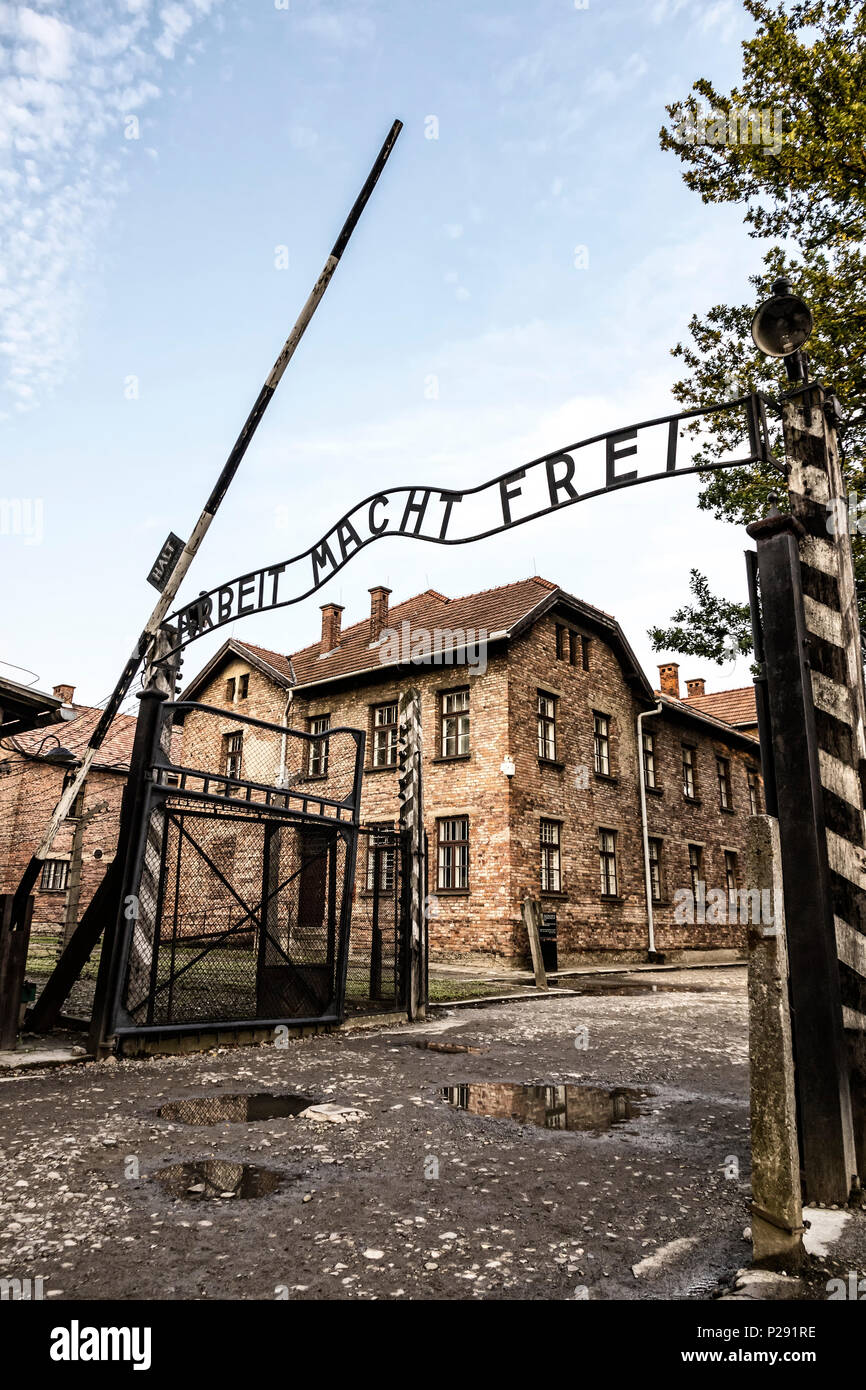 "Arbeit macht frei" sign on the main entrance gateway to Auschwitz-Birkenau (Auschwitz I) concentration camp near Oswiecim city, Poland. This German p Stock Photo