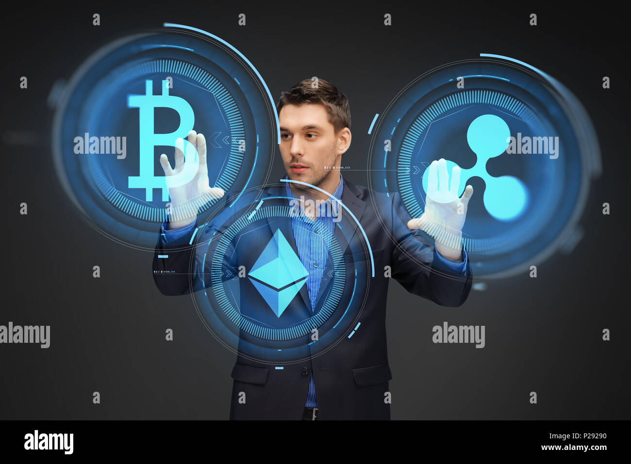 businessman with cryptocurrency holograms Stock Photo